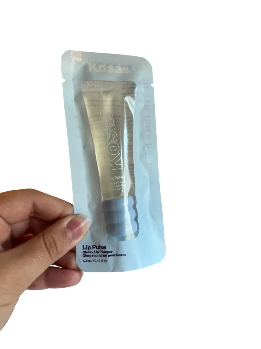Puffer Makeup Bag Bundle: Kosas Lip Plumper, LOOPS Mask, Hair Claw Clip, Shampoo